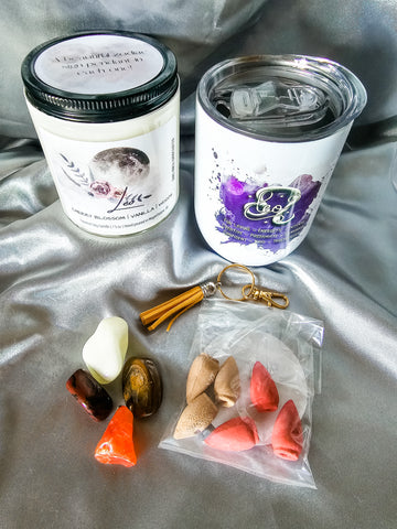 Leo zodiac candle gift box with mug, tumbled stones and incense cones.